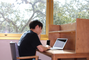 a man studying in LSU's main library