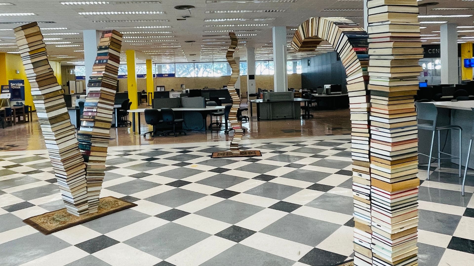 image of three book sculptures in the main library
